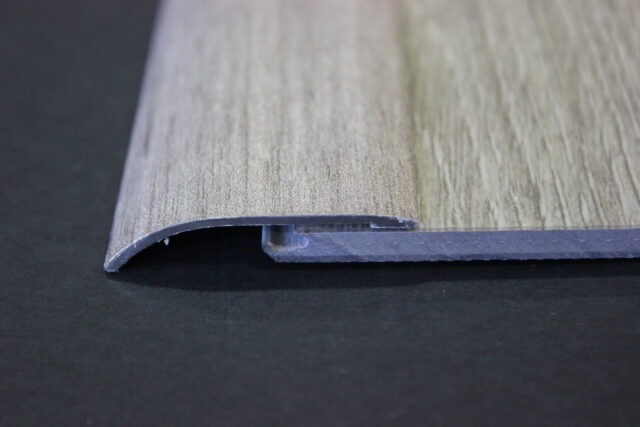 PERFIL estrella suelo vinílico 32